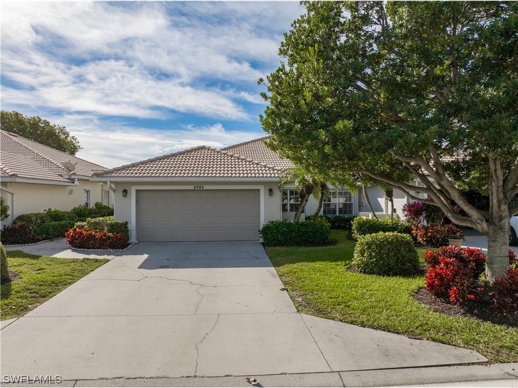 6948 Lone Oak Boulevard Naples FL 34109 223080219 image1