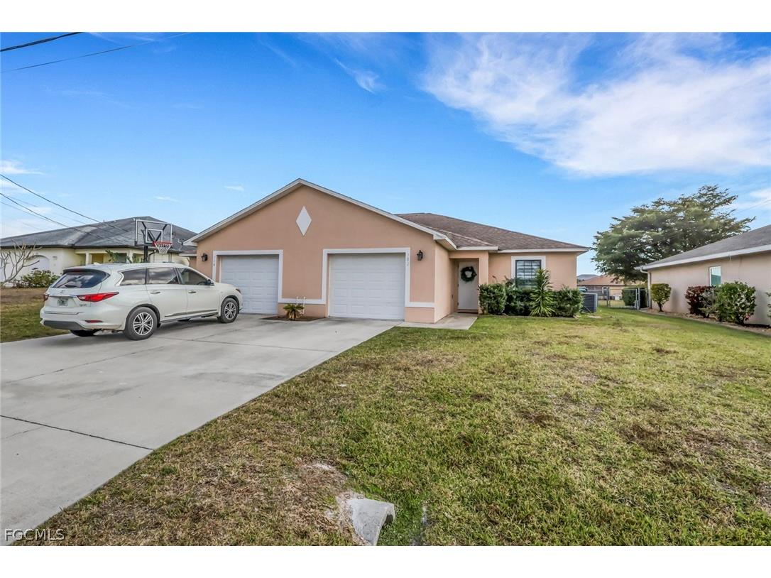702/704 SE 6th Terrace Cape Coral FL 33990 2026009548 image1