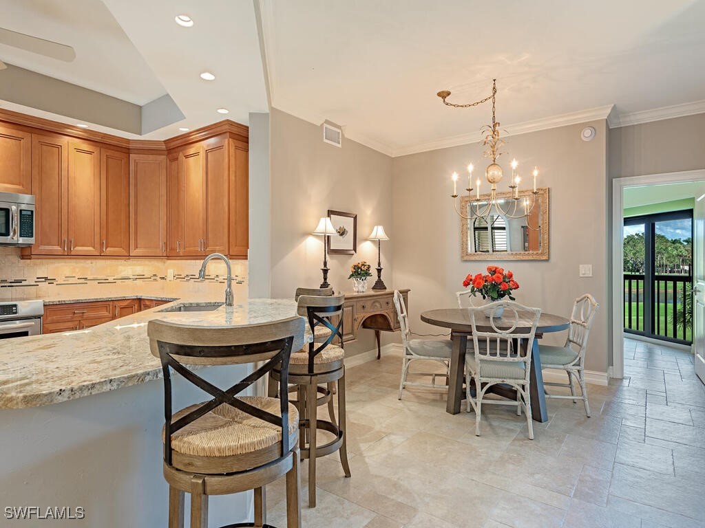 7032 Pelican Bay Boulevard #E202 Naples FL 34108 225077763 image5