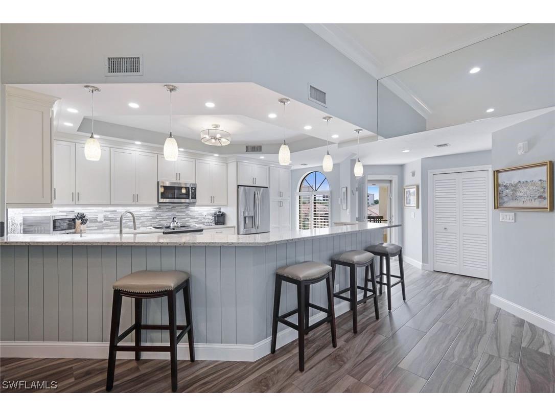 7048 Pelican Bay Blvd #305 Naples FL 34018 223067697 image1