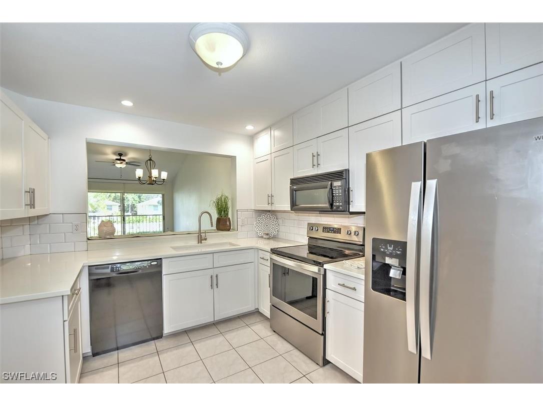 708 Landover Circle #203 Naples FL 34104 223077122 image1