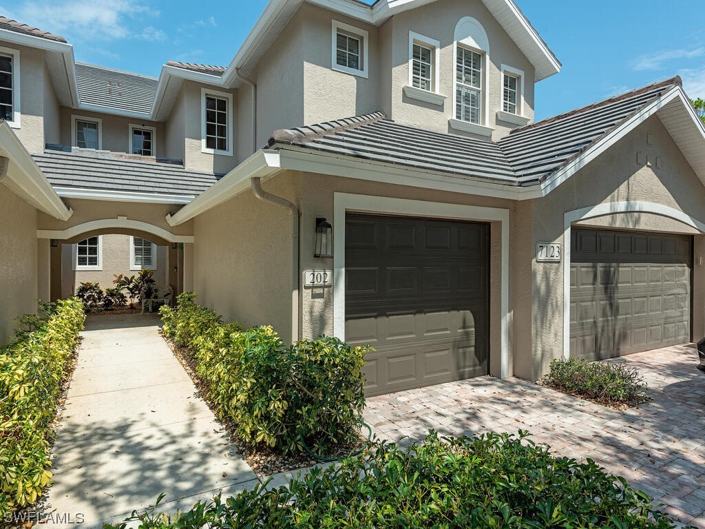 7123 Blue Juniper Court #202 Naples FL 34109 223041444 image1