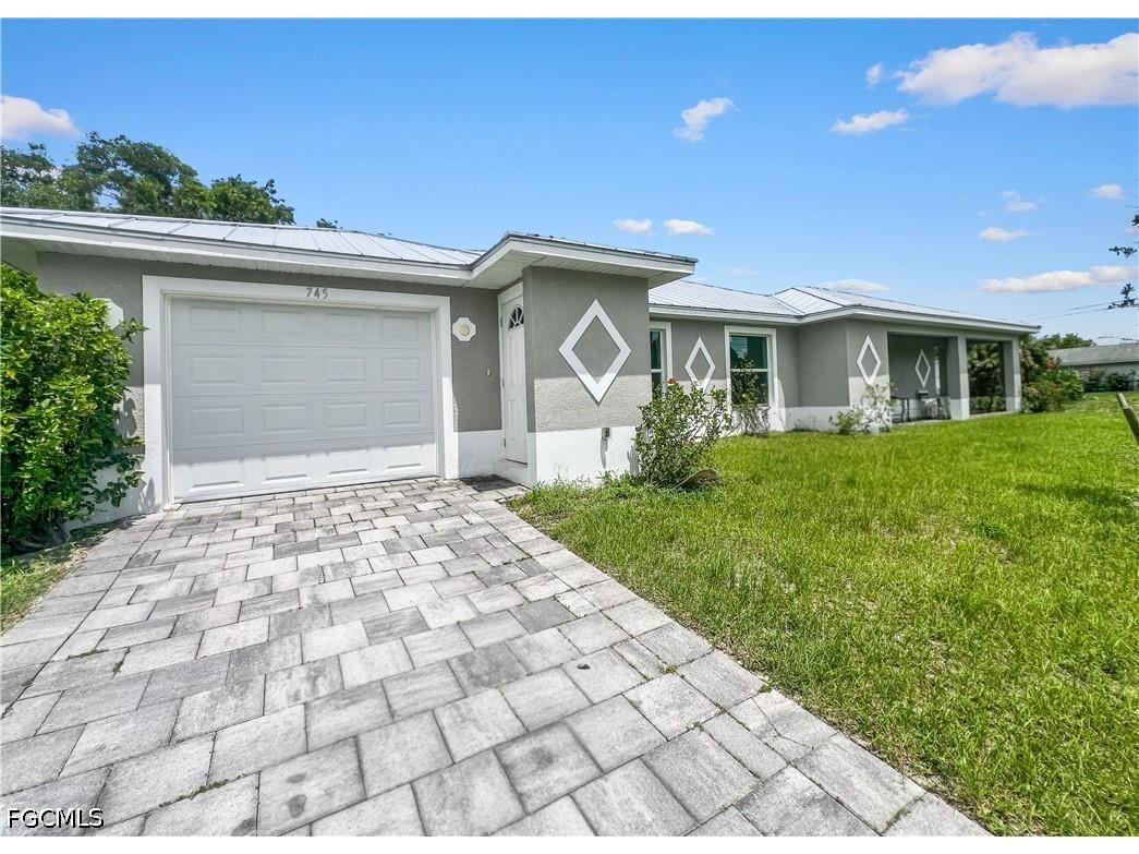 745 Harry Avenue S Lehigh Acres FL 33973 2026025366 image1