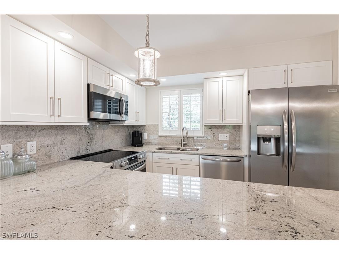746 Eagle Creek Drive W #104 Naples FL 34113 226011011 image1