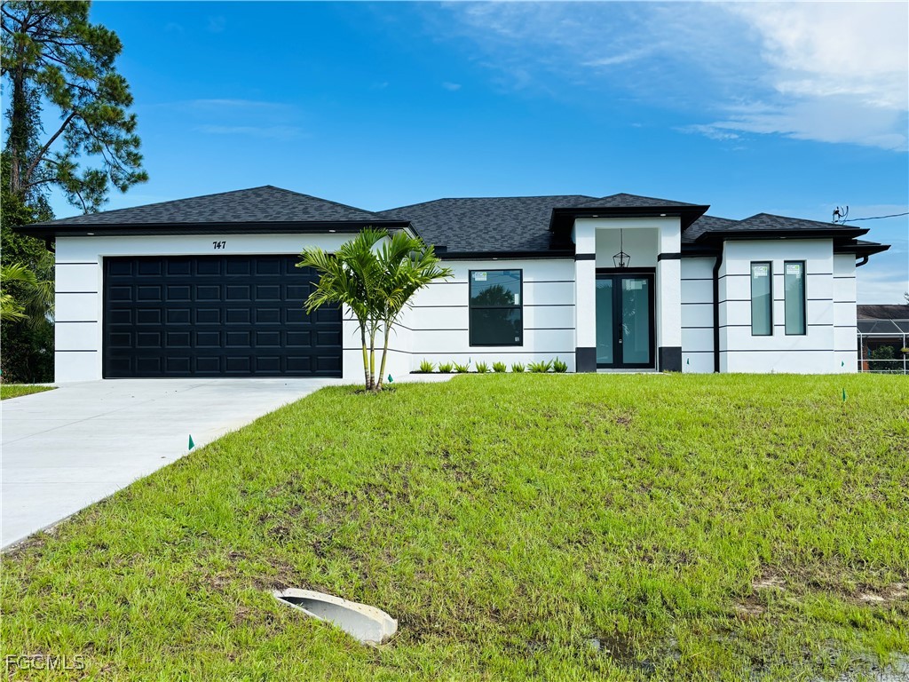 747 Spaulding Street E Lehigh Acres FL 33974 2025007677 image1