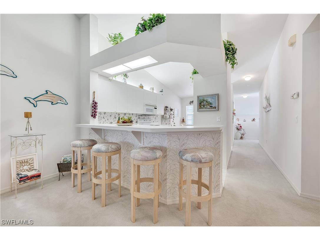 7577 Silver Trumpet Lane #203 Naples FL 34109 223011979 image1