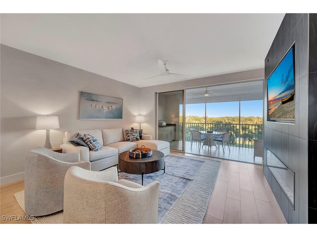 7671 Pebble Creek Circle #303 Naples FL 34108 225074250 image1