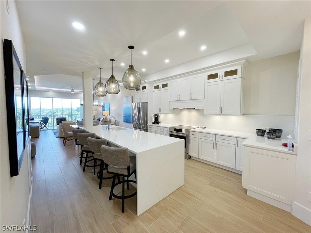 7687 Pebble Creek Circle #404 Naples FL 34108 223015966 image1