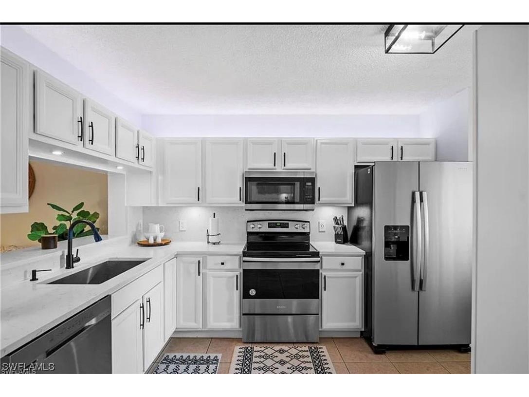 7785 Esmeralda Way #M-101 Naples FL 34109 223072402 image1