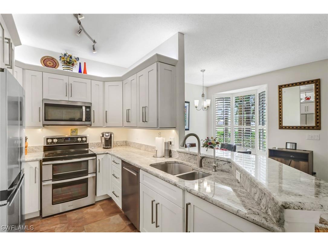 81 Silver Oaks Circle #7102 Naples FL 34119 223016780 image1