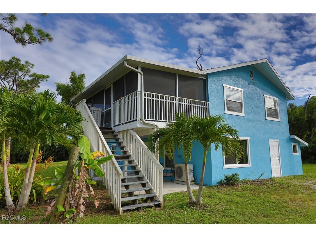 8642 Whispering Pines Drive Saint James City FL 33956 2025016327 image1