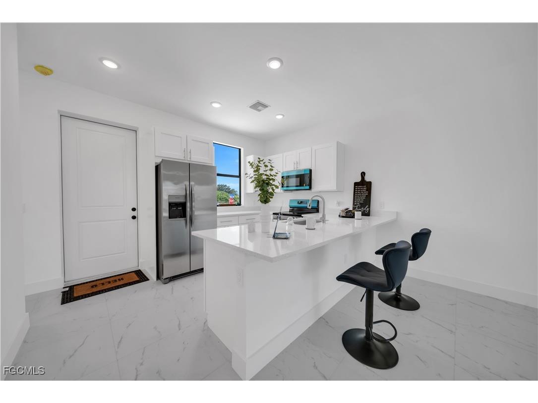 936/938 Homestead Road S Lehigh Acres FL 33974 2025020198 image1