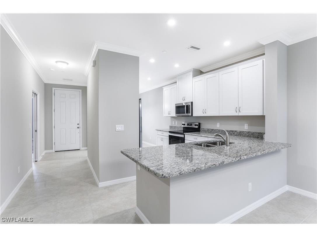 9394 Pocida Court #102 Naples FL 34119 223013983 image1