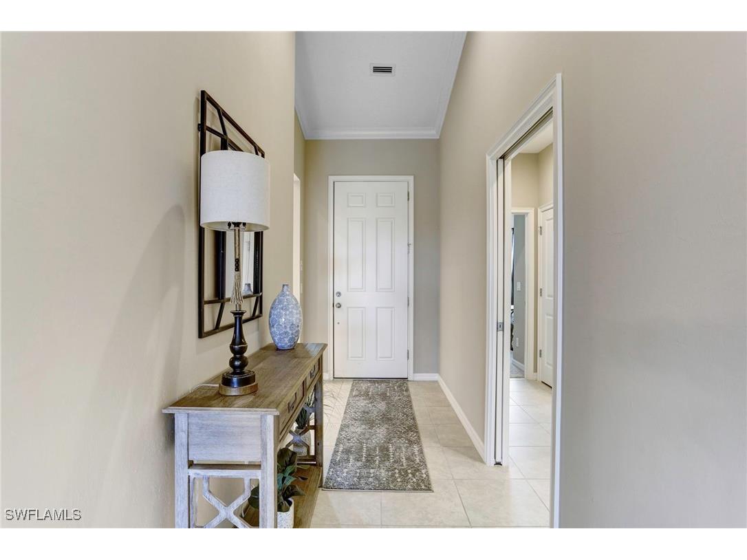 9433 Benvenuto Court #201 Naples FL 34119 225044666 image1