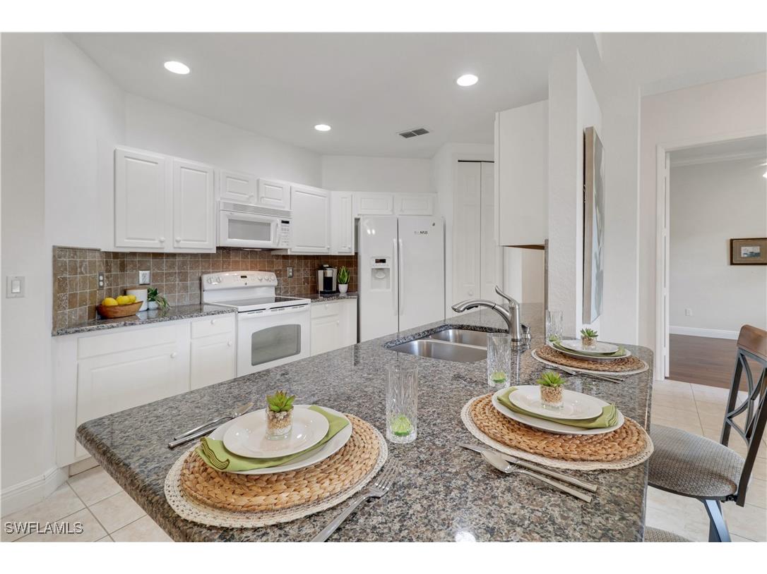 994 Eastham Way #V101 Naples FL 34104 225074086 image1