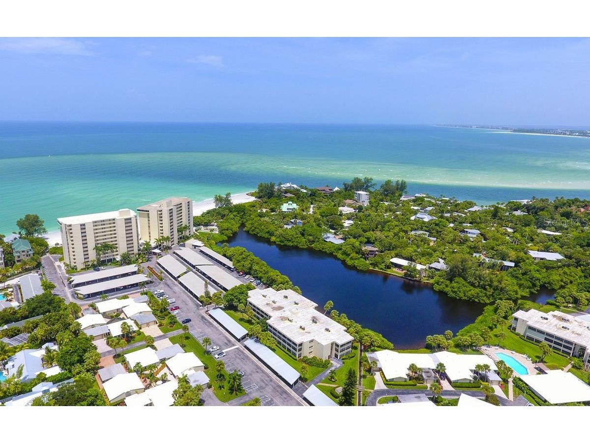 101 Whispering Sands Drive #203 Sarasota FL 34242 - GULF OF MEXICO LAGOON A4560597 image1