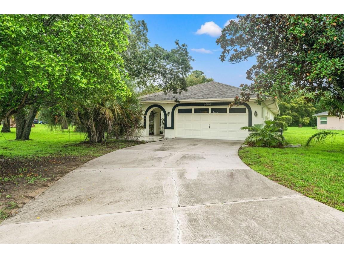 10186 Sleepy Willow Court Spring Hill FL 34608 TB8341862 image1