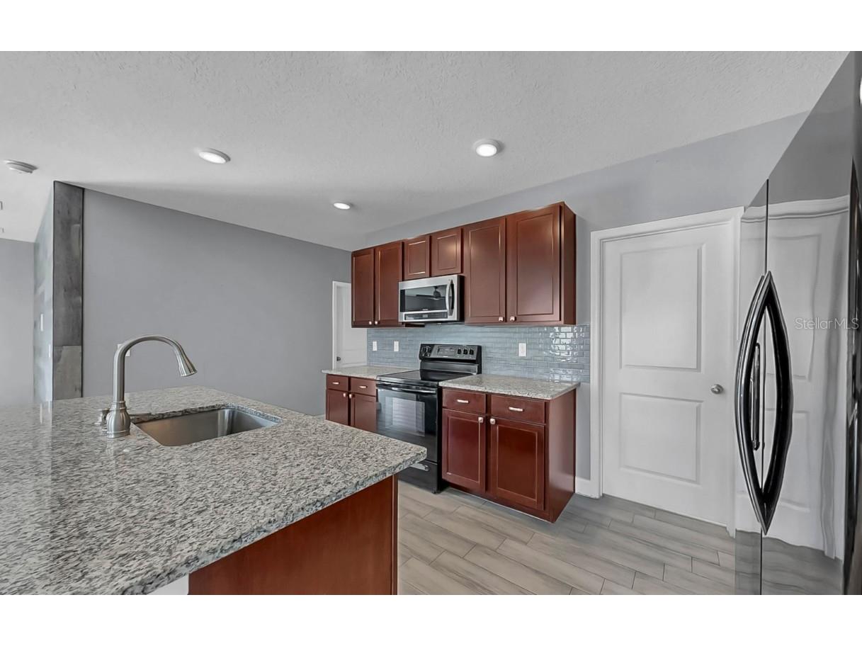 10237 Mangrove Well Road Sun City Center FL 33573 TB8454108 image10