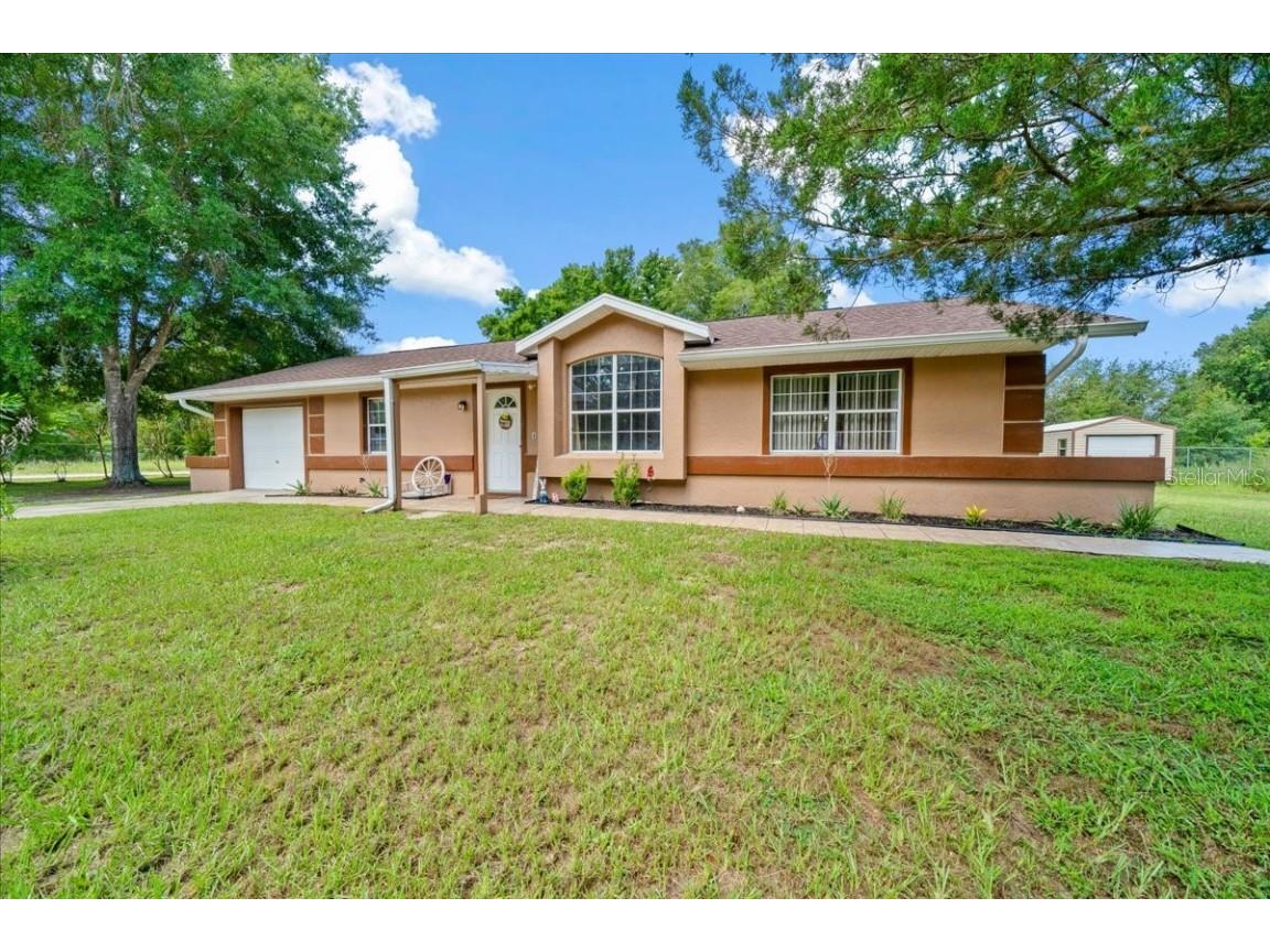 10390 SW 139th Court Dunnellon FL 34432 MLS: OM705826 Edina Realty