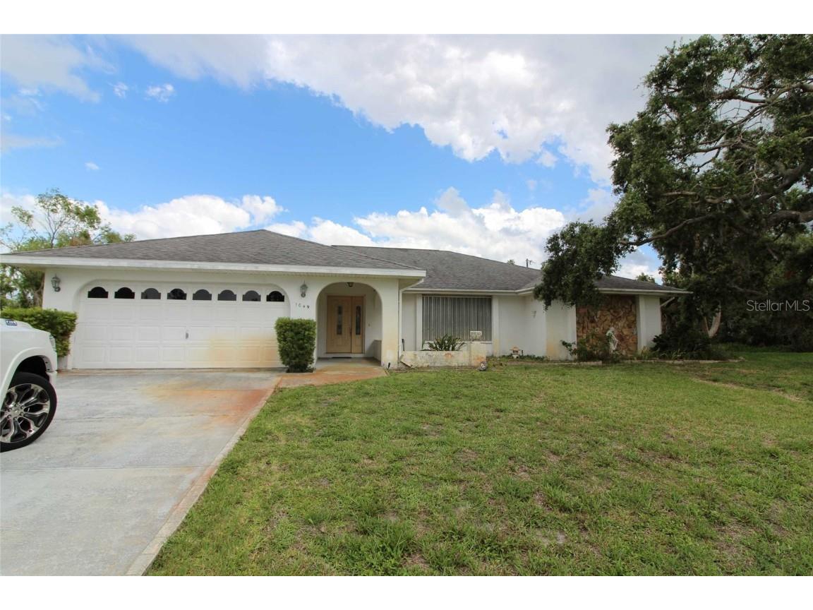 1049 Malay Terrace NW Port Charlotte FL 33948 C7477488 image1