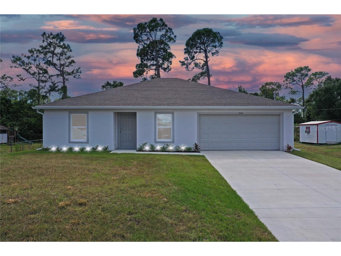 1049 Tropical Avenue NW Port Charlotte FL 33948 C7450450 image1