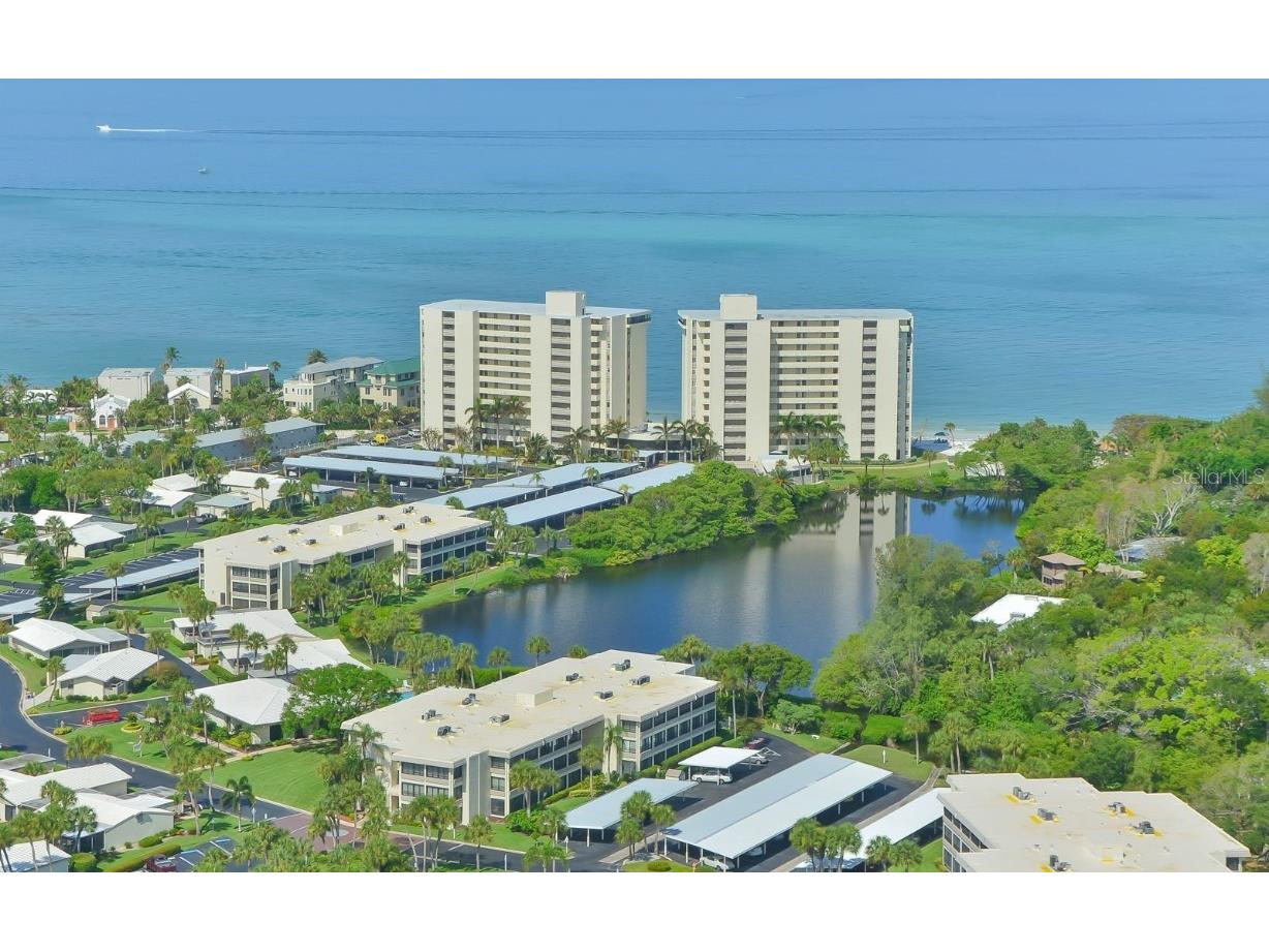 114 Whispering Sands Drive #V21 Sarasota FL 34242 - GULF OF AMERICA LAGOON A4670442 image1
