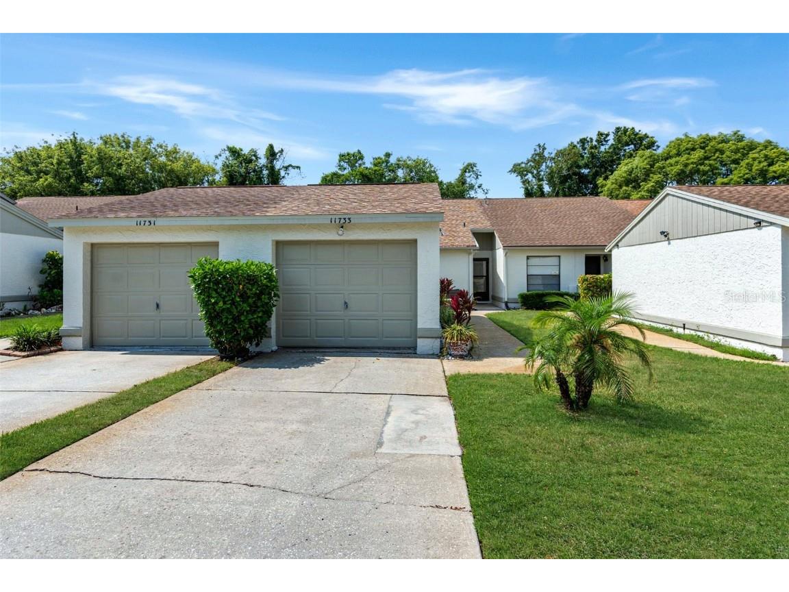 11733 Spring Tree Lane Port Richey FL 34668 W7864812 image1