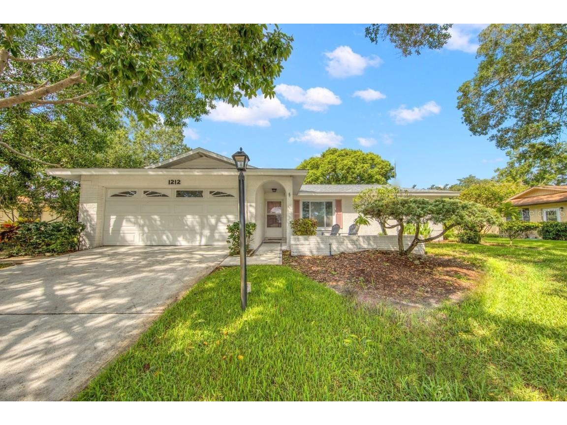 1212 Timberbrooke Drive Palm Harbor FL 34684 - LAKE TARPON U8212436 image1