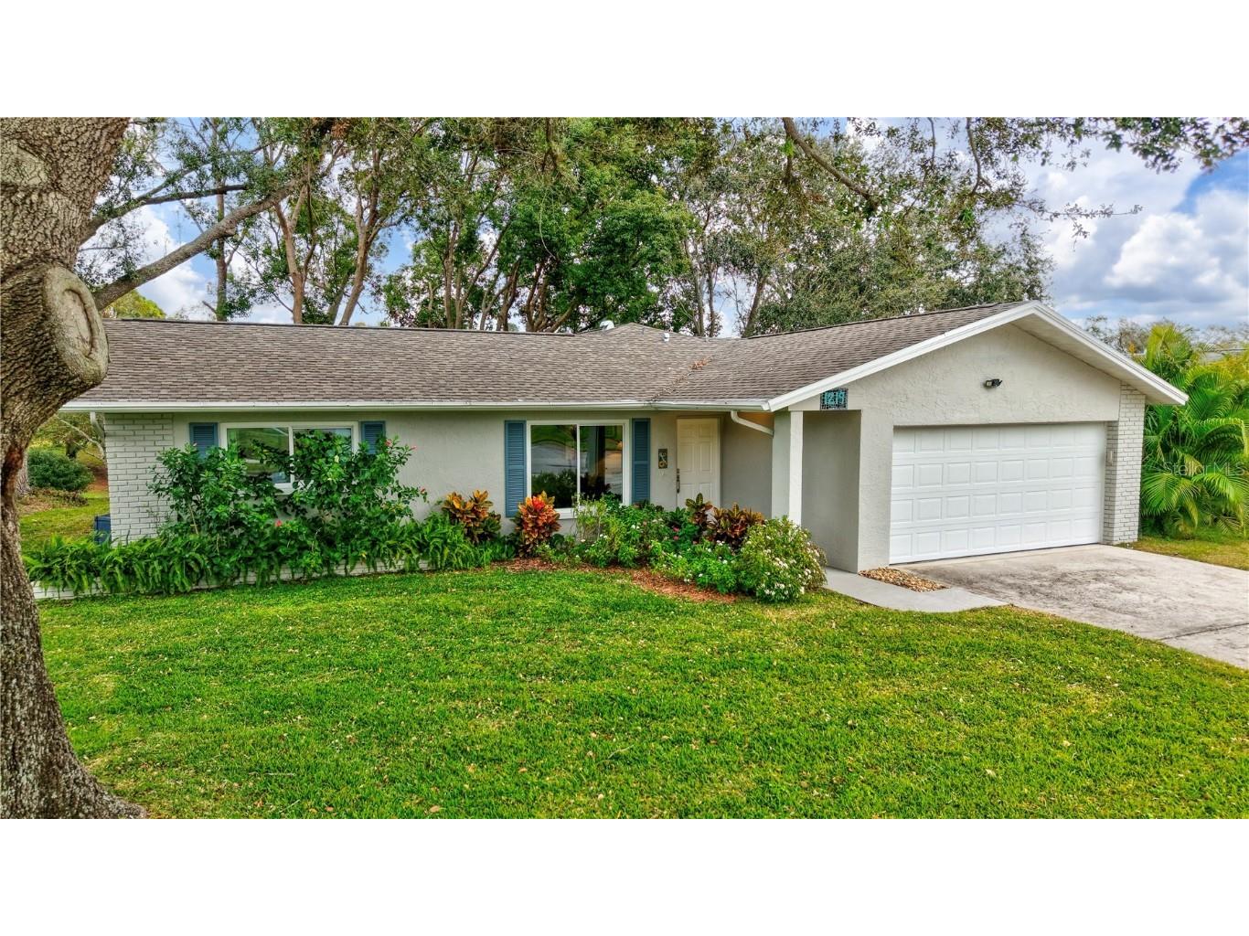 1219 Timberbrooke Drive Palm Harbor FL 34684 - LAKE TARPON TB8338376 image1