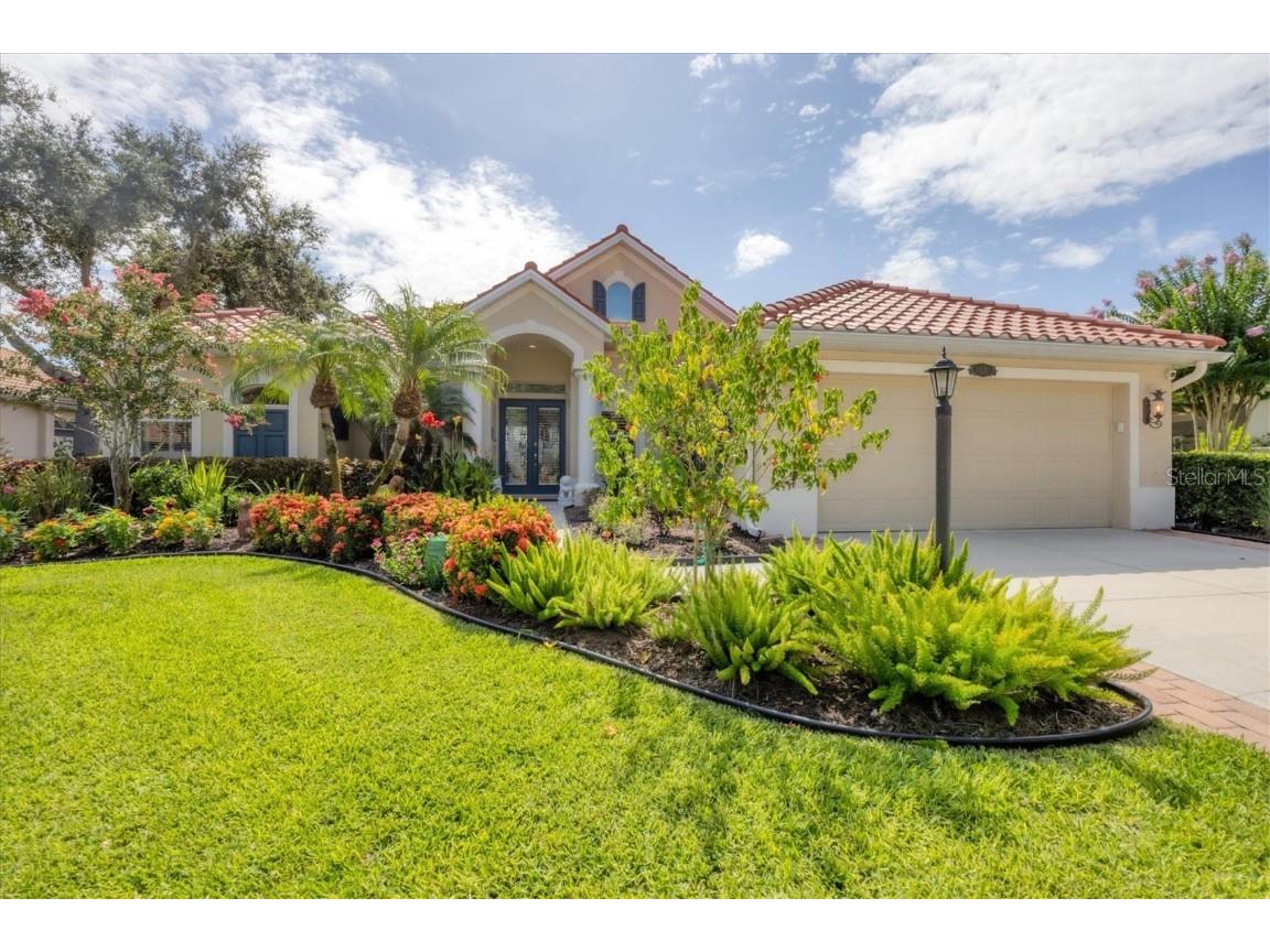 127 Park Trace Boulevard Osprey FL 34229 - LAKE IN NEIGHBORHOOD A4656790 image1