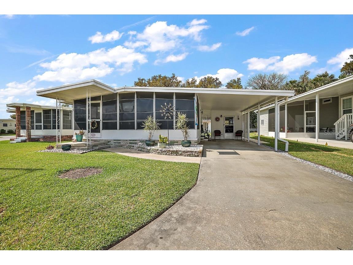 13 Cocos Plumosa Drive #A Eustis FL 32726 G5065909 image1