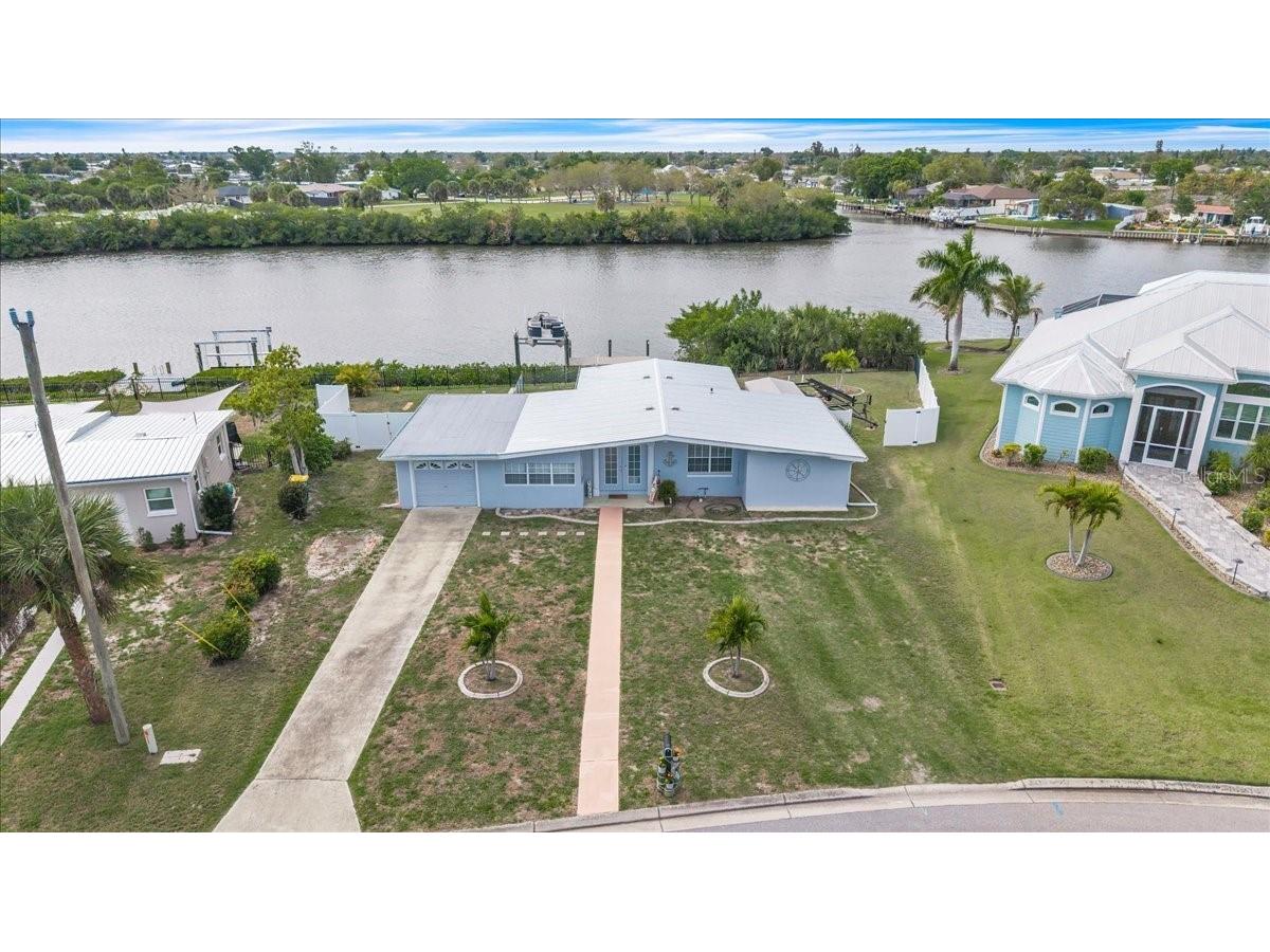 137 Poinsettia Circle NE Port Charlotte FL 33952 - ELKCAM WATERWAY C7523601 image2