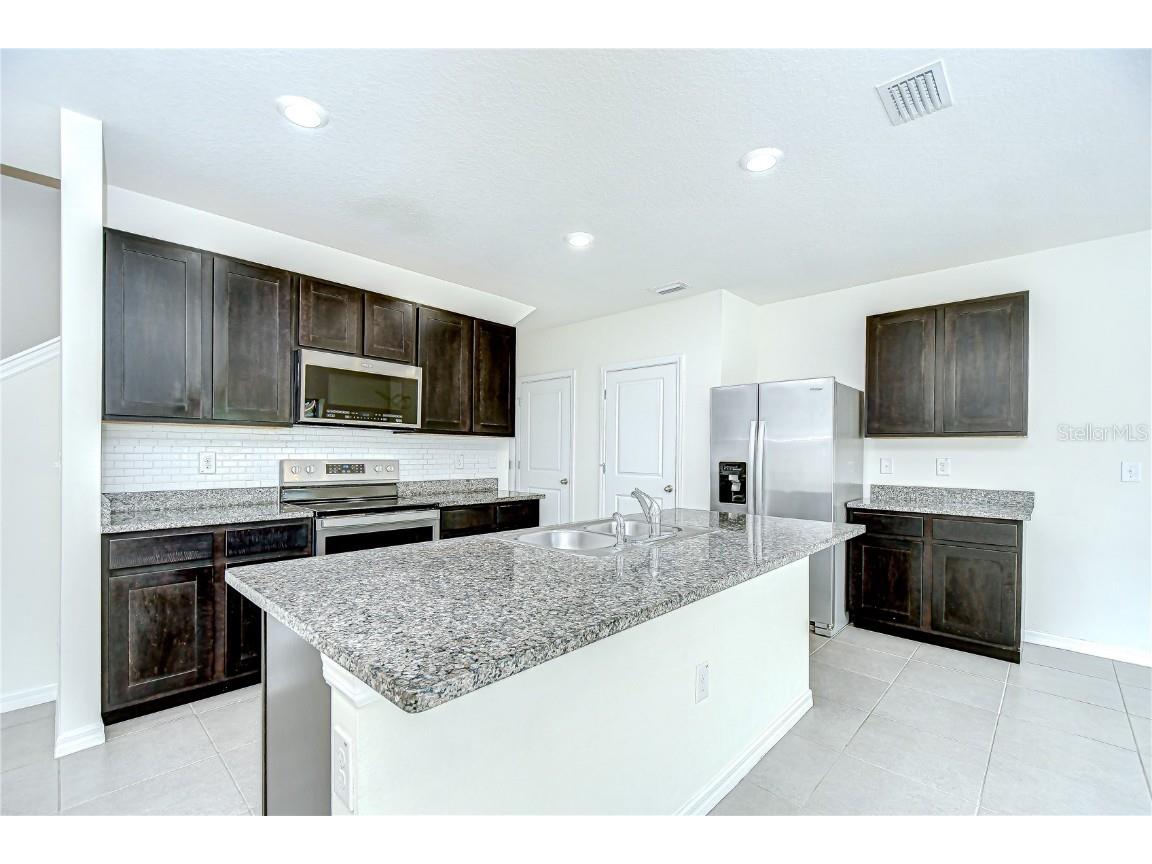 1382 Crescent Hoop Way Wesley Chapel FL 33543 TB8412277 image9