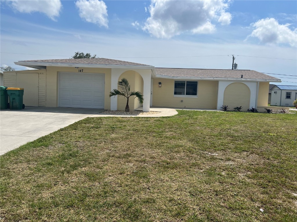 147 Bedford Drive NE Port Charlotte FL 33952 C7489980 image1