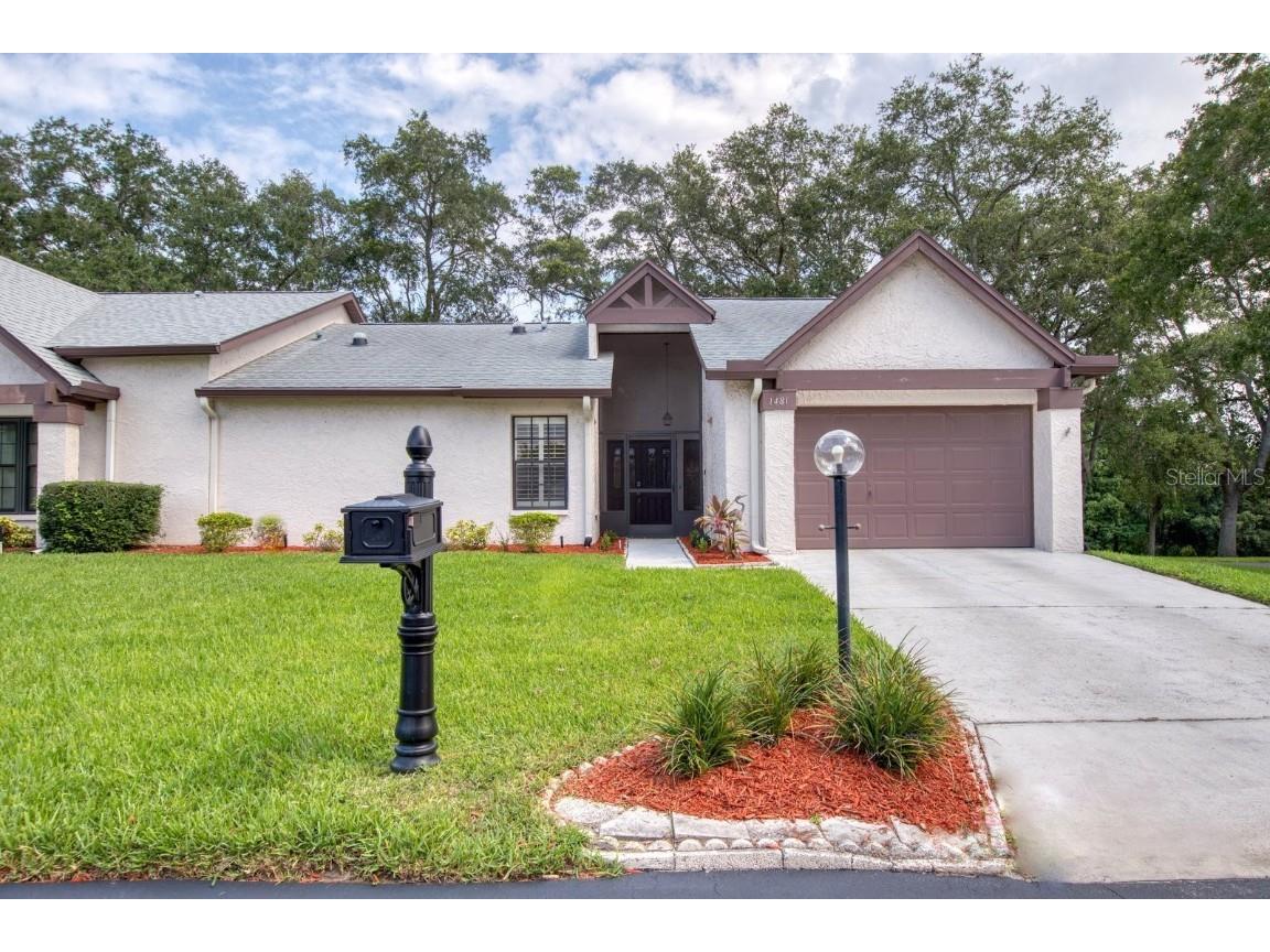 1481 Pheasant Creek Drive Palm Harbor FL 34684 - LAKE TARPON & GOLF COURSE PONE U8210235 image1