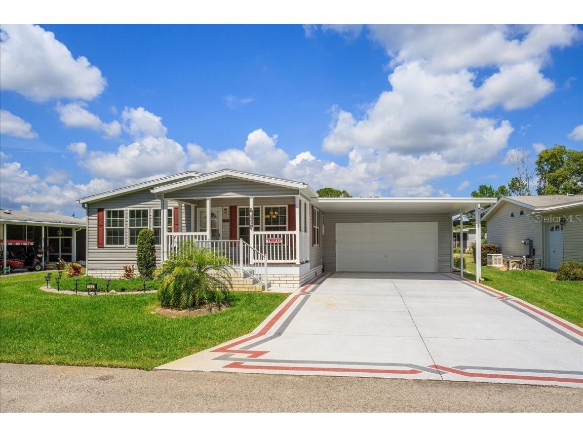 153 Sago Palm Drive Leesburg FL 34748 - LAKE HARRIS & CHAIN OF LAKES G5083046 image1