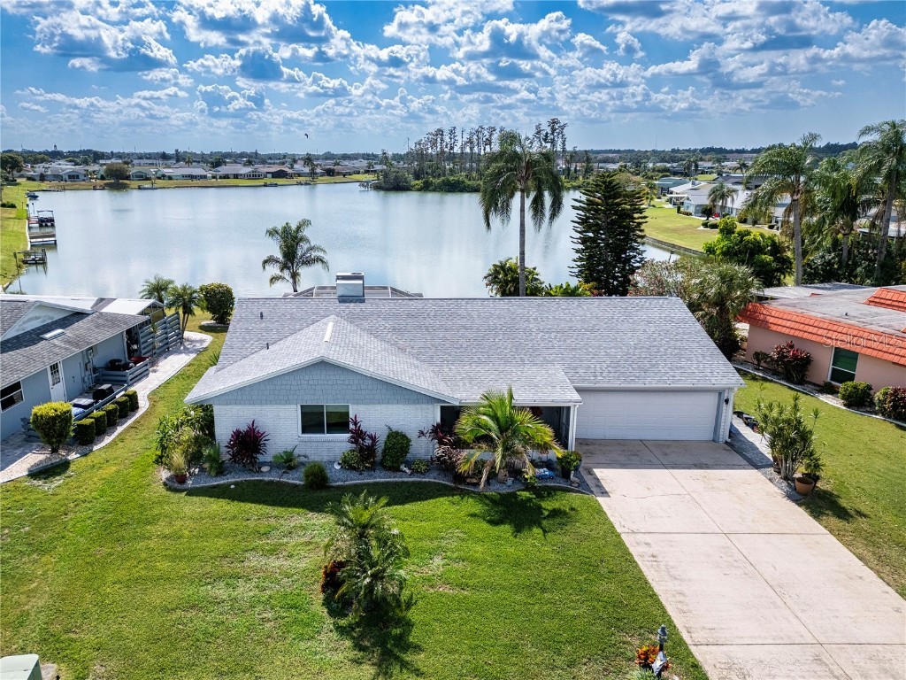 1606 Bunker Hill Drive Sun City Center FL 33573 - Middle lake TB8441356 image1