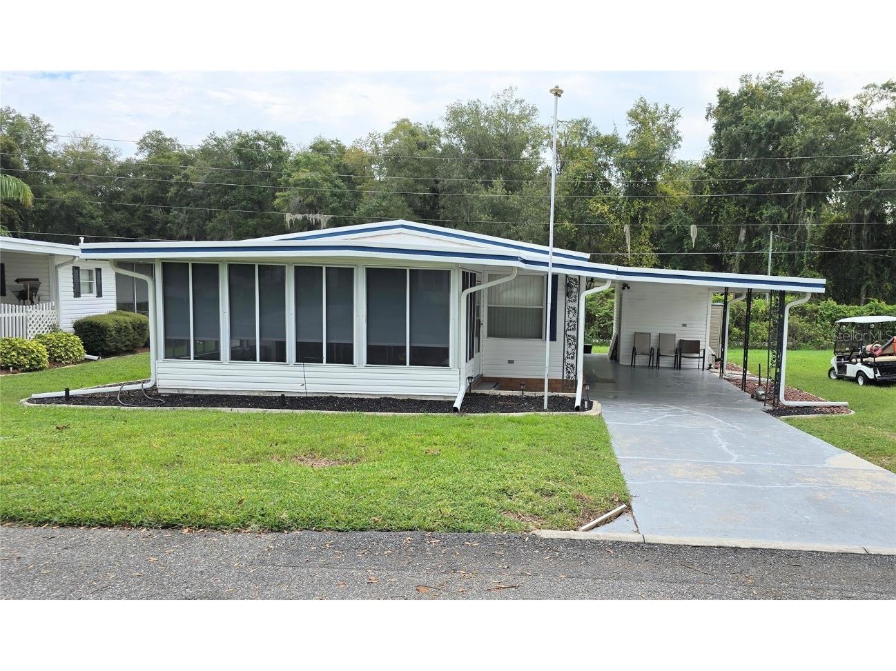 168 Jacaranda Drive Leesburg FL 34748 - LAKE HARRIS G5087670 image1