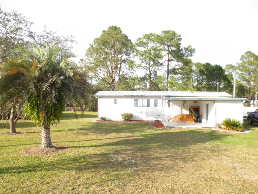 18881 SE 55th Place Ocklawaha FL 32179 - WILDERNESS POND OM673047 image1
