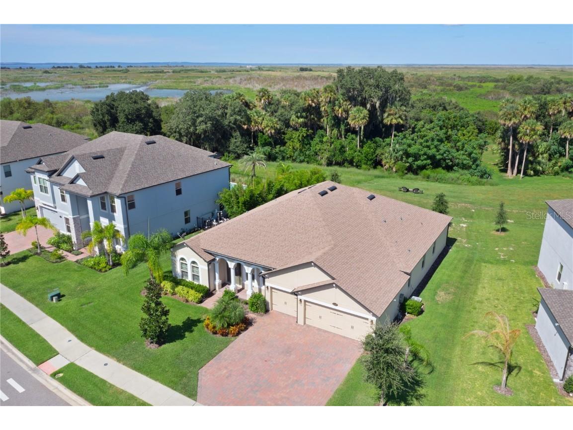 2145 Panoramic Cir Apopka FL 32703 - LAKE APOPKA BEHIND THE TREES O5976126 image1