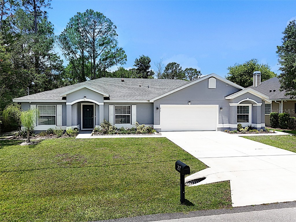 217 Birchwood Drive Palm Coast FL 32137 - BIRD OF PARADISE LAKE FC310100 image1