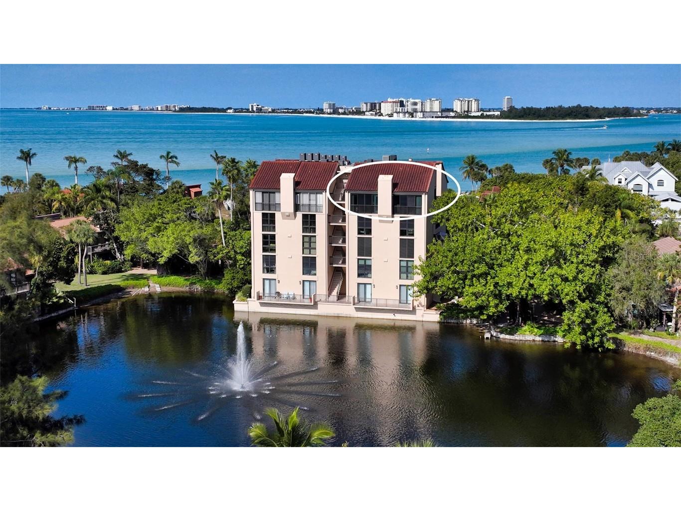 22 Sandy Cove Road #502 Sarasota FL 34242 - GULF OF MEXICO AND CEDAR LAKE A4533408 image1