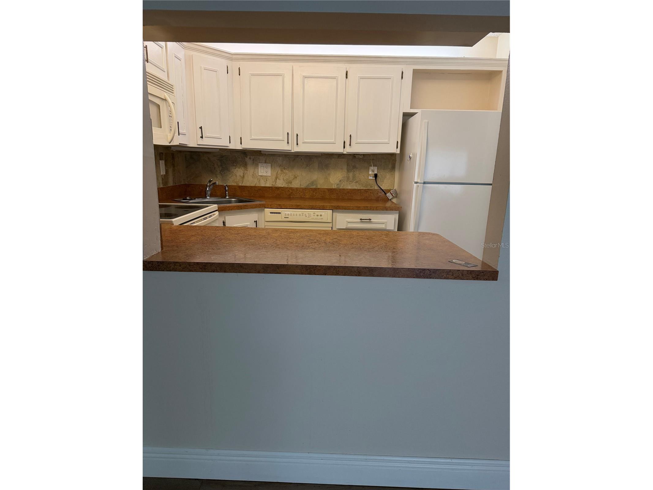 2687 Pine Ridge Way S #H1 Palm Harbor FL 34684 W7885546 image9