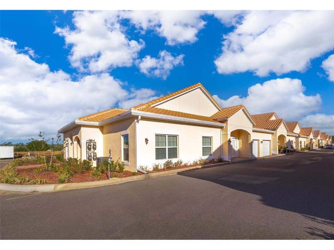 2911 Shantiniketan Boulevard #J-11 Tavares FL 32778 O6095269 image1