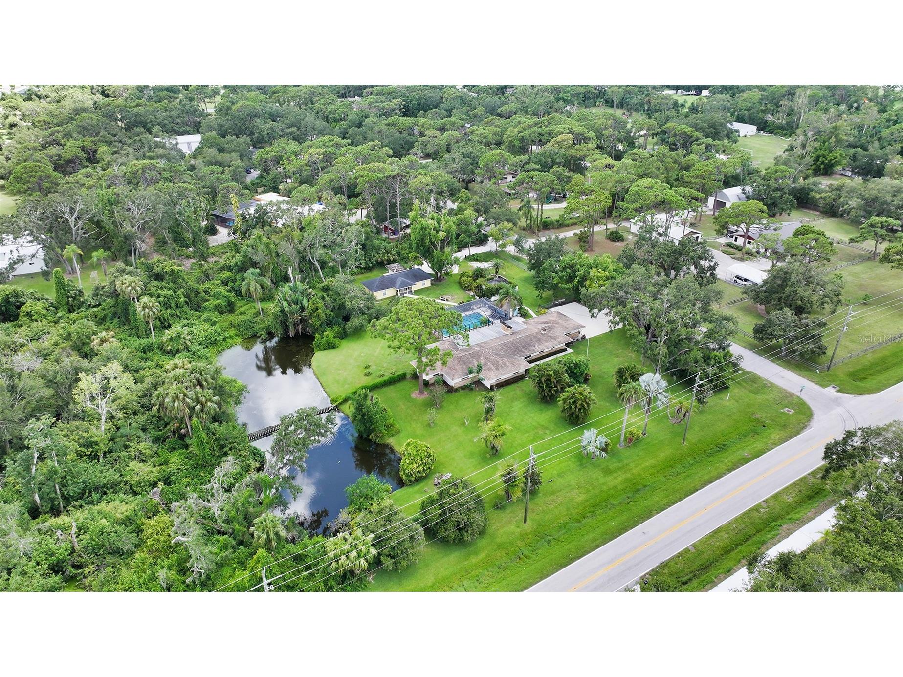 3012 Desoto Road Sarasota FL 34234 - POND LOCATED ON THE PROPERTY A4678237 image1