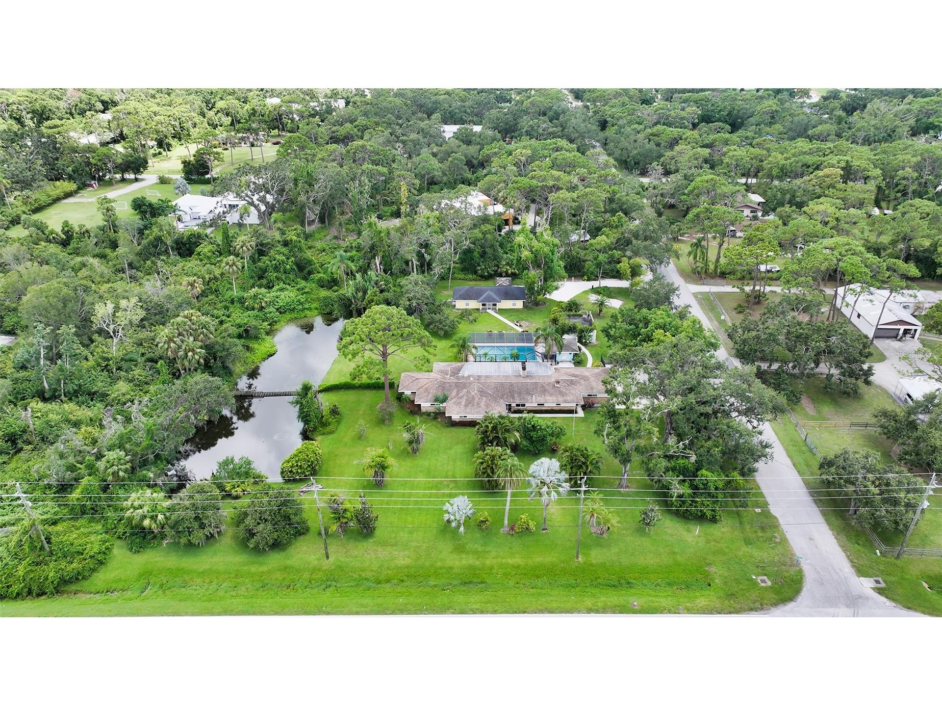 3012 Desoto Road Sarasota FL 34234 - POND LOCATED ON THE PROPERTY A4678237 image2