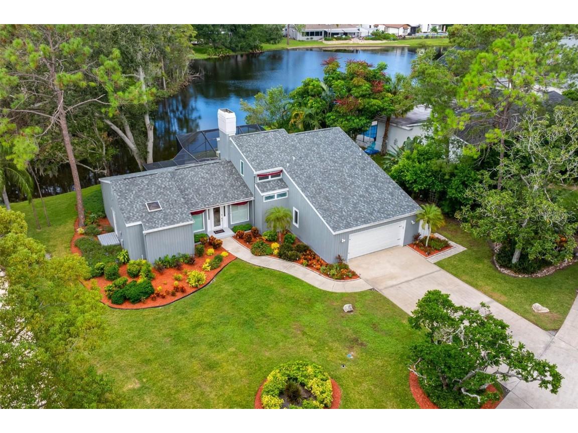 3126 Harvest Moon Drive Palm Harbor FL 34683 - AUTUMN LAKE TB8435248 image1