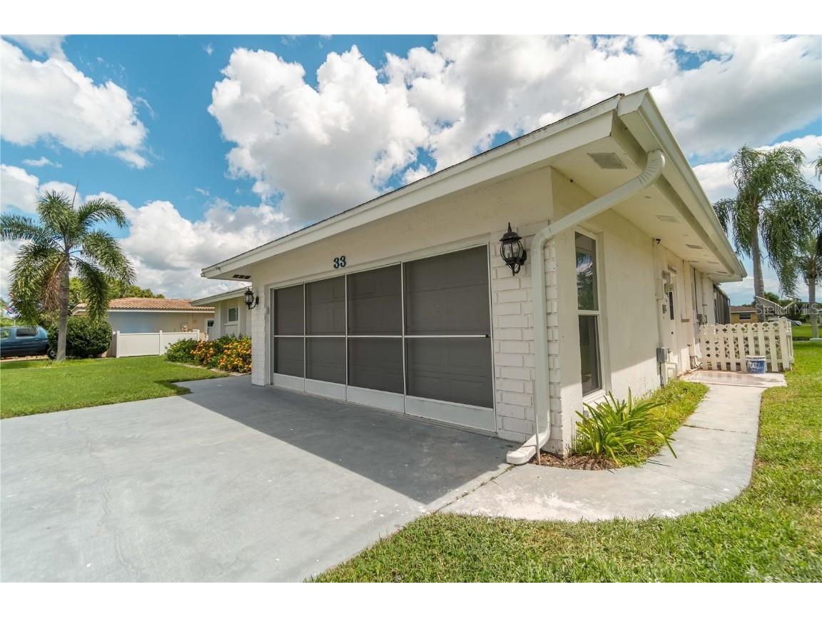 33 Caddy Road Rotonda West FL 33947 - OAKLAND HILLS CREEK A4672266 image1