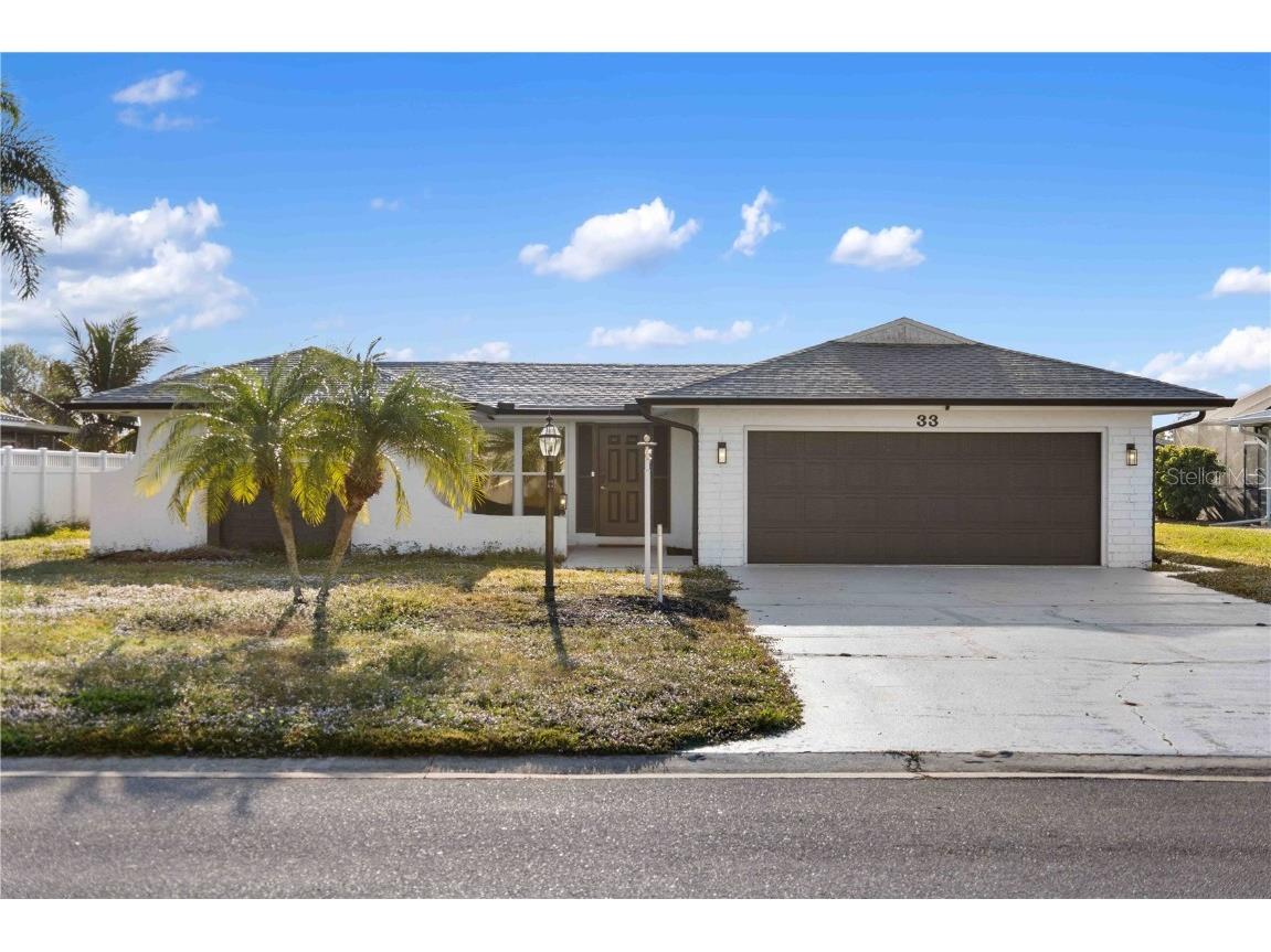 33 Caddy Road Rotonda West FL 33947 - OAKLAND HILLS CREEK A4673763 image1