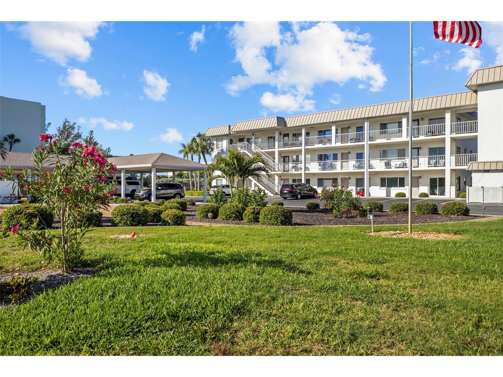 3330 Gulf Of Mexico Drive #107D Longboat Key FL 34228 - LARGE FRONTAGE ON SARASOTA BAY A4692214 image1